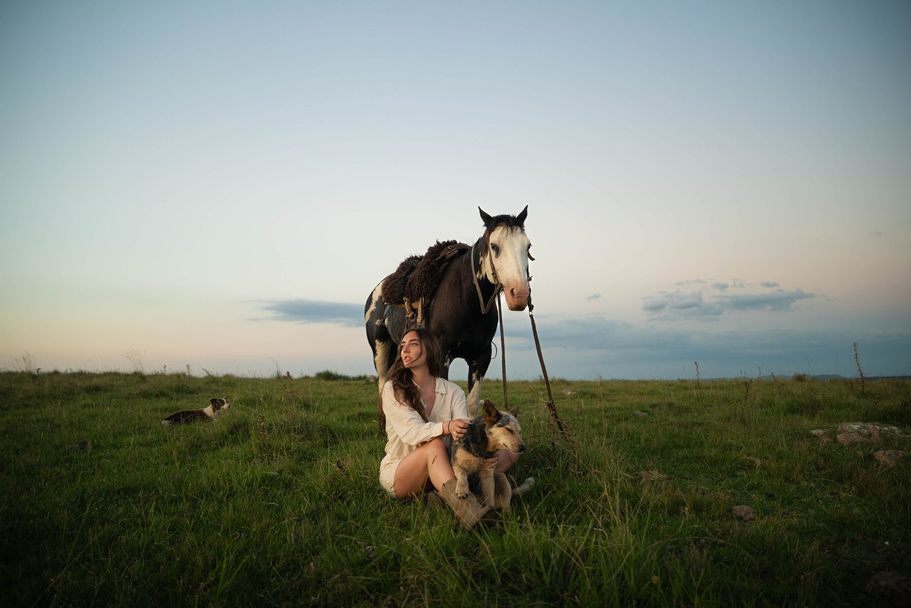 Susanne with her horse at dusk