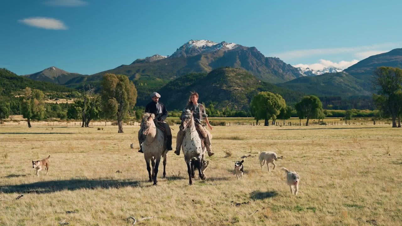 Horseback riders crossing the Patagonian wilderness