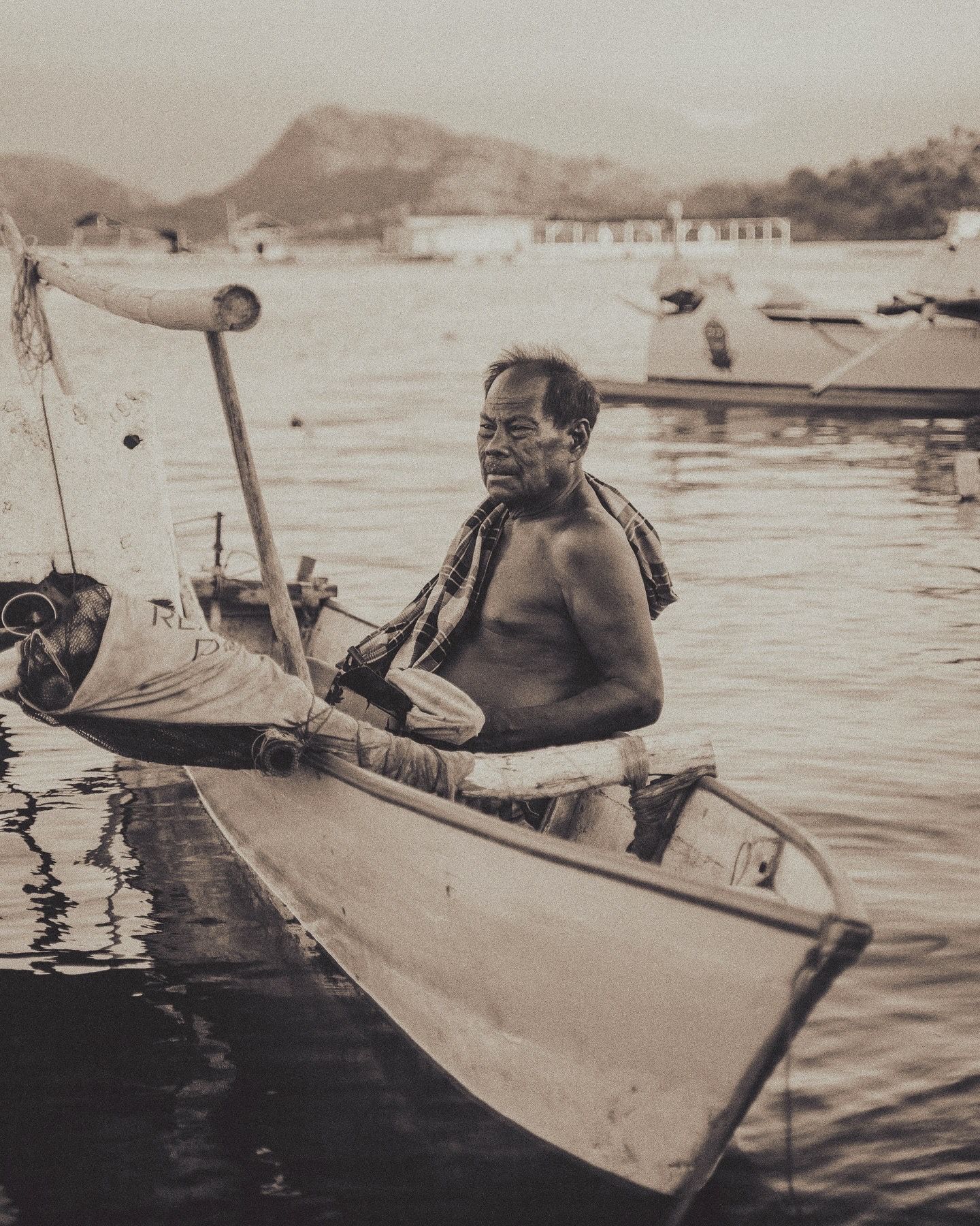 A fisherman in his canoe