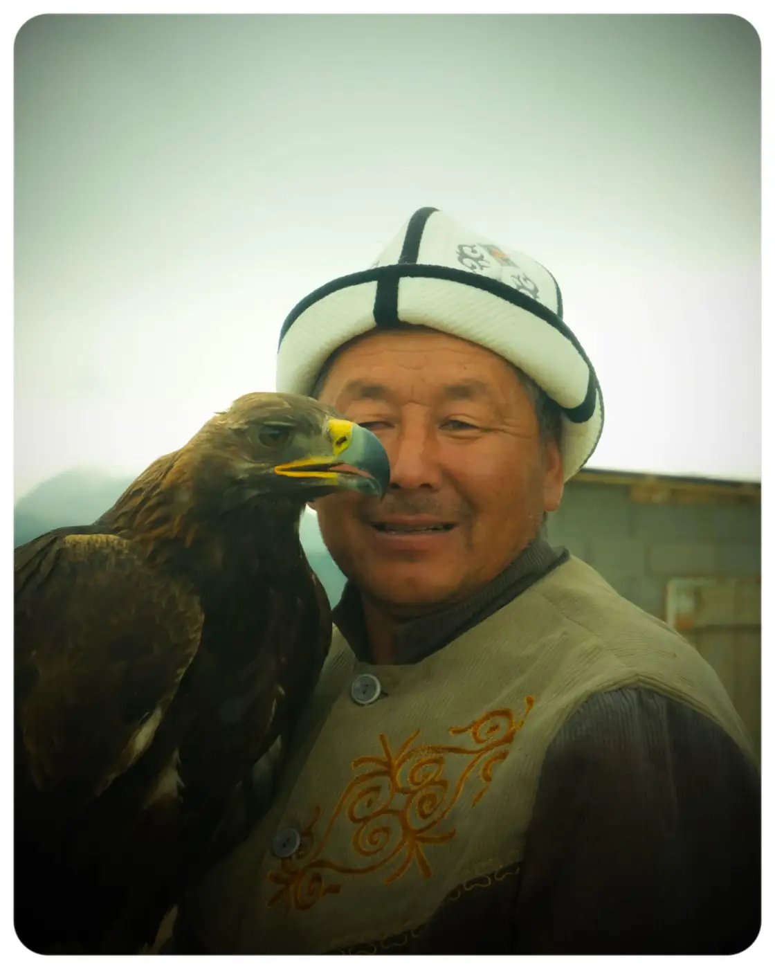 An eagle hunter with his golden eagle