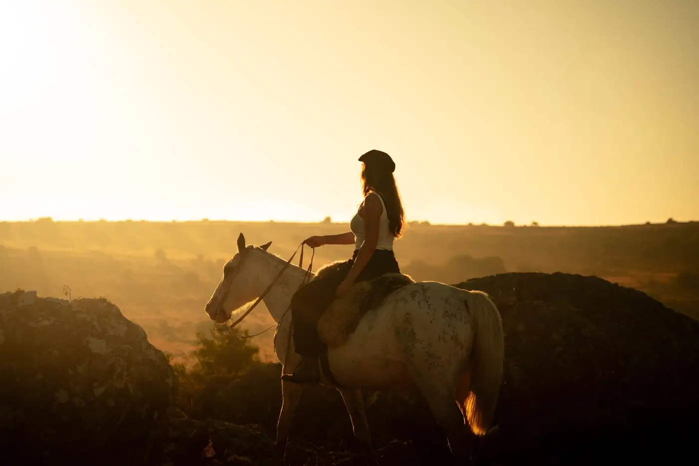 Riders at dusk on the campo